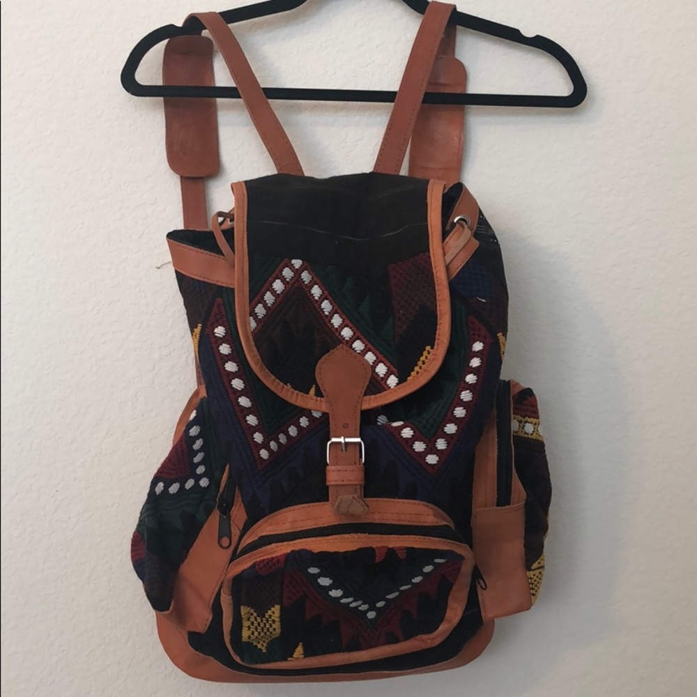 Leather, embroidered backpack